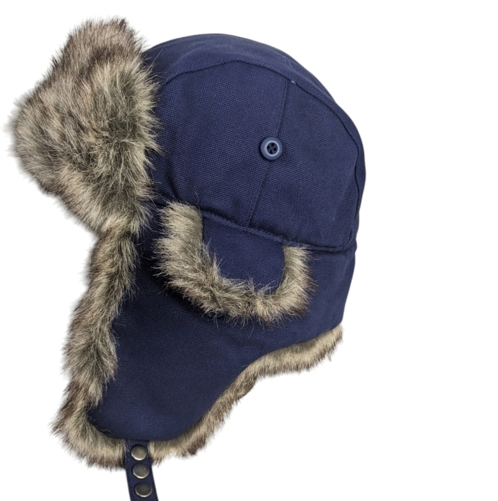 Surflex winter hat with flip down ear covers. Blue cap with faux fur lining